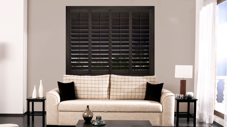 Atlanta sunroom with black shutters.